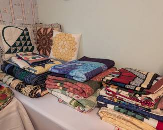 Lots of stunning handmade (machine stitched) quilts in various styles and sizes
