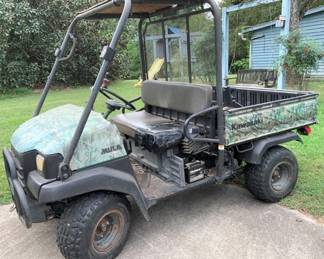 100 - Kawasaki Mule 3010 - 4WD (Description): 1425 hours - driver's seat has been repaired Used as is electric/electronic/mechanical item. No guarantee all components, untested.