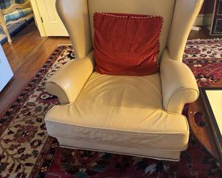 One of a pair of leather wing chairs