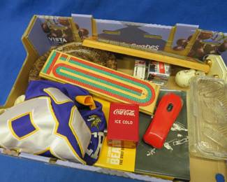 Lot 253. Cribbage boards, a stained Adrian Peterson jersey (Medium), and more