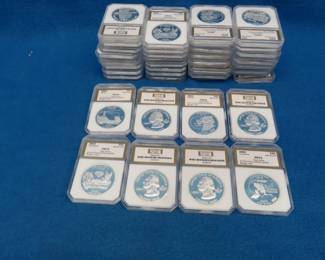 Lot 151. 40 slabbed replica or commemorative coins stamped "copy" and each featuring a state in the USA