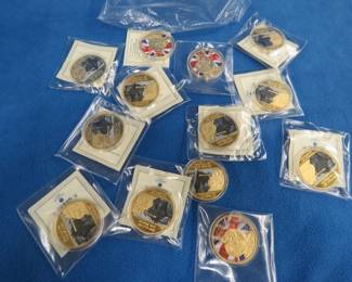 Lot 141. 13 American Mint commemorative battles of WWII1 3/4-inch diameter copper coins layered with 24k gold