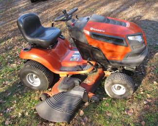 Lot 25. 2023 Husqvarna YTH 24K54 one-owner riding lawnmower, with 40-inch snowblower, and snowplow attachments. No reserve.