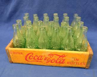 Lot 226. Vintage wooden Coca-Cola crate with 24 glass Coke bottles