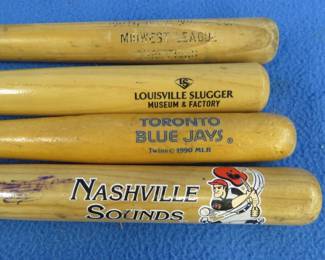 Lot 74. Four souvenir bats