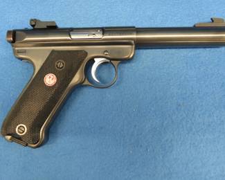 Lot 14. Ruger Mark II 22 LR semi-auto target pistol. S/N 225-66056. Includes case, manual, and parts list.