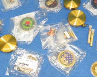 Lot 153. Collectible medallions and more: Five compasses. Cufflinks and lapel pins. Four tubes with an unknown gold substance. 10 misc. medallions