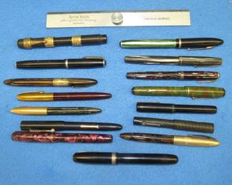 Lot 426. Vintage pens and a metal advertising ruler/straight edge