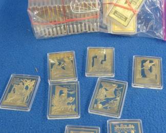 Lot 88. Approximately 43 gold-plated or gold-clad novelty ingots from the " Million Dollar Collector". Each ingot weighs 2.2. ounces