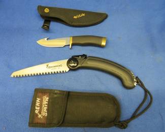 Lot 283. Buck skinning knife (has a name engraved on the blade) and a Browning hand-saw