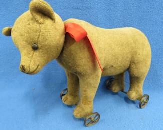 Lot 95. Vintage bear on wheels