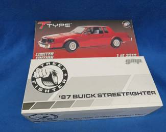 Lot 395. Two like-new die-cast cars in the boxes: 1985 Buick Regal and an '87 Buick Streetfighter