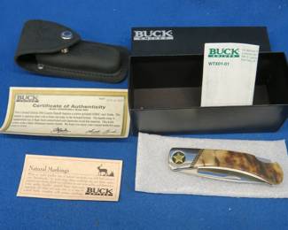 Lot 344. Limited Edition 500 Custom Duke Buck 3-inch folding knife and case in the box with a C/A