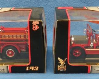 Lot 184. Two Signature Series 1:43 scale die-cast fire trucks