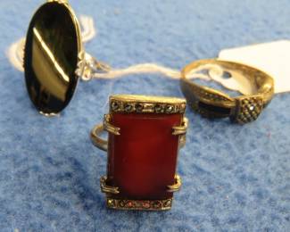 Lot 80. Three rings of unknown composition