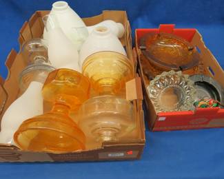 Lot 365. Amber oil lamp bases, chimneys, milk glass lamp shades, and glass ashtrays