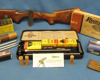 Lot 393. Two Wooden Gun Stocks, Remington Gun Cleaning Kit (Box), Assorted Shot Gun Shells, and More
