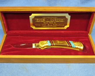 Lot 343. Dave Yellowhorse Buck-Custom 3-inch folding knife in a wooden display box