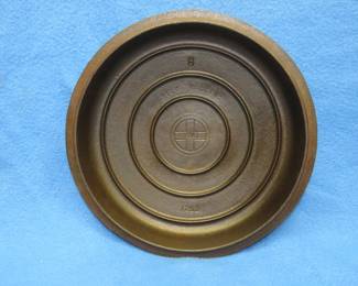 Lot 28. Griswold cast iron #8 self-basting 1288 lid