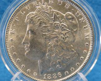 Lot 412. 1886 P Morgan silver dollar