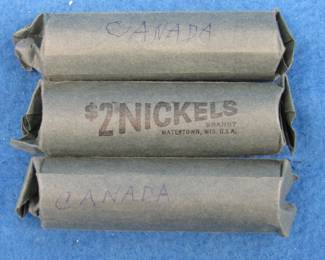 Lot 68. 3 rolls of Canadian nickels marked and rolled by the consigner. Uncounted and unsearched by AAA.
