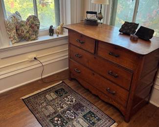 Kashmir rug. On top of pretty dresser are old textile stamps