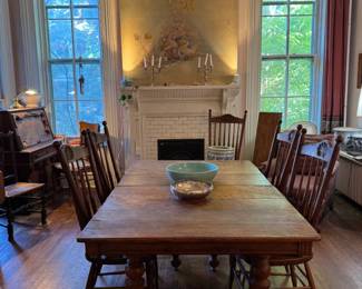 Clawfoot dining room table is 5'9" x 3'8". Shown in pictures with 2 leaves in, there are 5 leaves total. Each leaf adds an additional foot to the table
