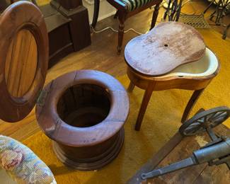 Antique wheeled wooden commode and wooden French bidet on right!