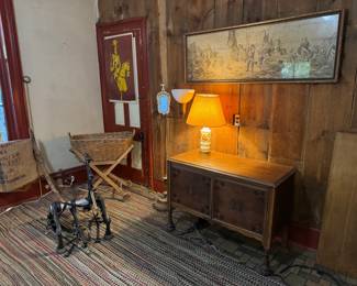 Bike carrier for car, there's another one on the front porch too. Neat sideboard piece, very old laundry cart on left!
