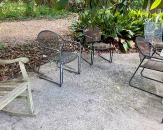 Black, steel mesh patio armchair