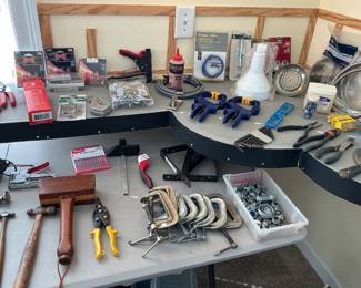 Wire cutters, hammers, sea clamps,