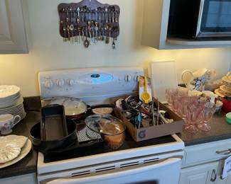 Metal pans, utensils, and collection of spoons