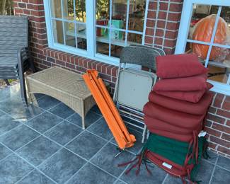 Outdoor cushions and wicker table