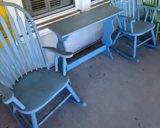 3 Pastel Colored Rocking Chairs with Blue Pastel Plant StandSide Table