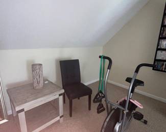 Solid wood, grey end tables with power outlets -set of two. Exercise bike and bands. Black chairs- set of 4