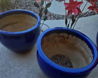 Two Large Blue Stoneware Pots and Two Large Handcrafted Metal Floral Pieces