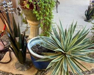 Two Potted Succulents and a Metal Floral Design