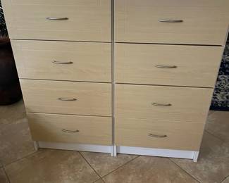 Two Light Colored Wood Cabinets