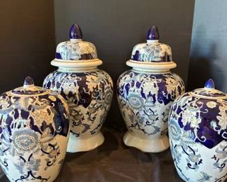 Four Blue and White Lidded Vases