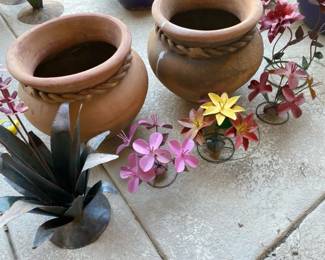 Two Terracotta Planters and Five Handcrafted Metal Floral Pieces