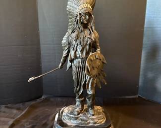 A Bronze Sculpture of a Native American