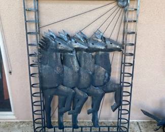 Rustic Metal Wall Art Sculpture Featuring a Row for Stylized Galloping Horses