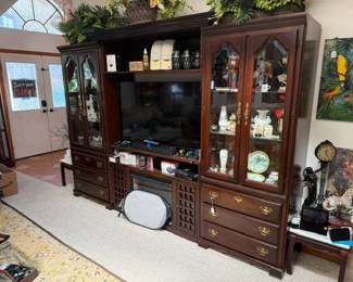 traditional cherry entertainment center, tv, mid century collectibles, german nutcrackers