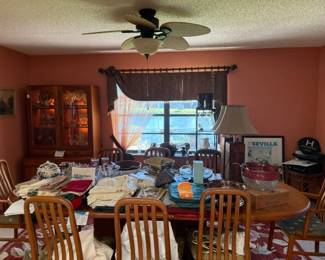 mid century dining set and hutch, mid century rare lamps, dining linens, professional camera drone