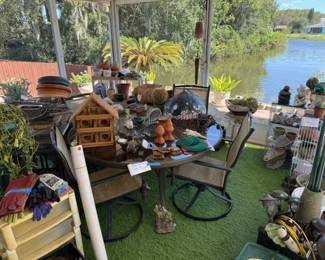 garden and patio items. planters, pots, birdhouse, patio table, plants