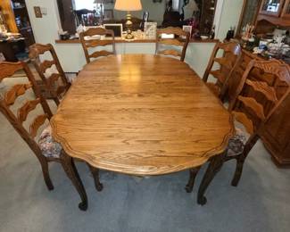 48"x66" with 1 leaf added showing 6 of 10 chairs