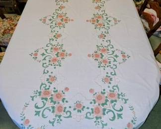 This is a 67"x120" tablecloth with detail stitching. 11 matching fabric napkins