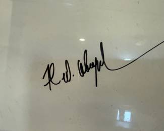 Frank Abagnale's signature on the "Catch Me If You Can" poster. The real-life con artist whose story inspired the movie.