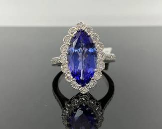 White gold tanzanite and diamond ring