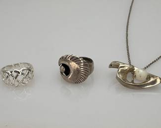 Silver tone rings and pendant